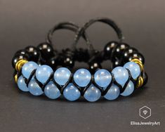 "Natural Blue Jade Black Onyx Beaded Adjustable Bracelet Macrame Protection Yoga Mala Men's Bracelet Women's Bracelet Crystal Bracelet -ALL THE PRODUCTS AT ELISAJEWELRYART ARE HANDMADE AND MADE WITH NATURAL BEADS. -WHAT DOES THE BLUE JADE STAND FOR Blue Jade is a talisman of peace and serenity. It calms and restores, like a veil of slow moving clouds covering the moon. It is spiritual. It ranges in color from pale to mid-blue, sometimes a pale bluish-green, and is widely used to temper emotional Yoga Mala, Bracelet Macrame, Blue Jade, Handmade Beaded Necklaces, Bracelet Crystal, Mala Bracelet, Men's Bracelet, Onyx Bead, Jade Beads