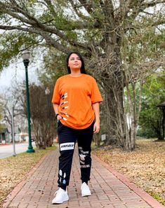 "RurouniKupo Joggers Our Ateez sweatpants are inspired by their new song Halazia.  Sweats are screen printed with white, blue, and a soft orange, in the front and back   Key Features: - Unisex Sweatpants/Joggers - Made from 100% cotton for a breathable, comfortable fit. - Lightweight and soft for all-day comfort. - Standard US slim fit, elastic waistband with drawstrings, ribbed ankle cuffs, and waistband. - Screen Printed  - Seatpants s are 100% cotton -Sweats have the \"RurouniKupo\" logo on t Cotton Hip Hop Sweatpants For Streetwear, Cotton Sweatpants For Hip Hop Streetwear, Hip Hop Graphic Print Pants For Streetwear, Hip Hop Graphic Print Relaxed Fit Bottoms, Hip Hop Style Graphic Print Relaxed Bottoms, Hip Hop Graphic Print Streetwear Pants, Casual Graphic Print Pants For Streetwear, Cotton Pants With Graphic Print For Streetwear, Cotton Sweatpants For Streetwear Hip Hop Style