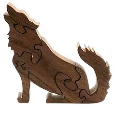 a wooden cutout of a dog on a white background