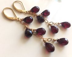 Sexy Garnets! These are all about 8-9 mm each so they are not too heavy to wear. Faceted Teardrop Rhodolite "pink" garnets dangle from your choice of sterling silver, 14k gold filled or 14k rose gold filled chain. Please note the earwires shown are an upgrade from the standard price. Length is about 2.5". Please choose your earwire preference. Your jewelry will arrive beautifully giftboxed. Elegant Cheap Burgundy Jewelry, Luxury Rose Gold Garnet Jewelry, Opal Bar Necklace, Blush Earrings, Pink Garnet, Emerald Green Earrings, Wire Jewelry Tutorial, Garnet Jewelry, Rainbow Earrings