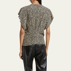 Etoile Isabel Marant "Delocia" blouse featuring an abstract motif  V-Neck Short sleeves Fitted at the waist  Hem sits at the hip Pullover style Viscose Dry clean Imported Abstract Motif, Etoile Isabel Marant, V Neck Blouse, Bergdorf Goodman, Isabel Marant, Pullover Styling, Tops Designs, Dry Clean, Short Sleeves