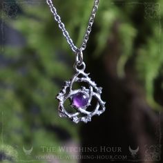 This triquetra pendant surrounded with ivy leaves, is handmade with high quality pewter. It is decorated with a natural amethyst of 6 mm. - Sold without chain or with a stainless steel chain of 46 cm / 17" or 60 cm / 24" (hypoallergenic) - Size of the celtic knot: 2,5 x 2,1 cm This celtic knot pendant is totally handmade with high quality pewter, in our small french studio. The triquetra (celtic knot) is made of fine pewter (97% pure). This high quality pewter does not contain any dangerous subs Triquetra Necklace, Triquetra Pendant, Celtic Triquetra, Celtic Knot Pendant, Celtic Trinity Knot, Ivy Leaves, House Items, Trinity Knot, Pagan Jewelry