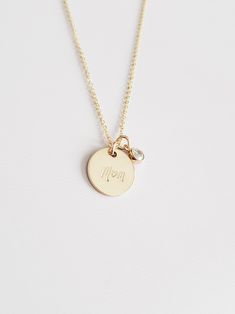 "Love Mom Necklace - 14K Gold Filled - Mothers Gift - Mom Heart Pendant Necklace - Charm Necklace - Personalized Necklace - Gift - 1/2 inch The perfect Mother's day gift to show your love and respect for your Mothers! * Dimensions: -1/2 inch Diameter 14K Gold Filled Circle Disc Pendant -4mm Cubic Zirconia * Necklace Chain Length: Available in 14in, 16in, or 18in ---------------------------------- HOW TO ORDER 1. Select the length that you would like from the drop down menu. This listing is for ( Mother's Day 14k Stamped Charm Necklace For Anniversary, 14k Stamped Charm Necklaces For Anniversary And Mother's Day, Stamped 14k Charm Necklace For Mother's Day Anniversary, 14k Gold Stamped Charm Necklace For Mother's Day, 14k Charm Necklaces For Anniversary And Mother's Day, 14k Gold Hand-stamped Charm Necklace For Anniversary, Everyday 14k Stamped Jewelry For Mother's Day, Hand Stamped Yellow Gold Necklace For Anniversary, Mother's Day 14k Stamped Everyday Jewelry