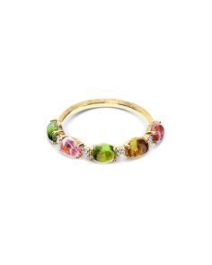 A colorful 18kt ring in gold, diamonds and tourmaline boules with a timeless charm. A jewel that with great elegance celebrates the encounter between Nature and craftsmanship. DIAMONDS:- Weight (total): 0.06 CT- Clarity: VS- Color: G- Cut: roundNatural stones:- TOURMALINE Weight (total): 2.15 CT Fine Jewelry Multi-stone Tourmaline Gemstones, Multi-stone Tourmaline Fine Jewelry, Elegant Multicolor Rings With Rose Cut Diamonds, Luxury Tourmaline Jewelry With Rose Cut Diamonds, Multi-stone Tourmaline Gemstones, Multicolor Tourmaline Gemstones For Fine Jewelry, Multicolor Tourmaline Gemstones Fine Jewelry, Multicolor Tourmaline Fine Jewelry, Multicolor Tourmaline Rings With Gemstone Accents