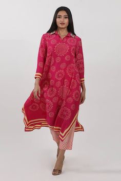 Pink A line long sleeve tunic with block printed and hand embroidered collar.
Components: 1
Pattern: Embroidered
Type Of Work: Thread, Pearl
Neckline: Shirt collar
Sleeve Type: Three-quarter
Fabric: Modal
Color: Pink
Other Details: 
Note: Pant worn by the model is not for sale
Occasion: Puja, Work - Aza Fashions Festive Long Sleeve Block Print Kurta, Spring Kurta With Long Sleeves And Printed Motifs, Spring Long Sleeve Kurta With Printed Motifs, Long Sleeve Block Print Kurta, Pink Long Sleeve Kurta With Printed Motifs, Traditional Long Sleeve Tunic With Dupatta, Bohemian Long Sleeve Tunic With Dupatta, Pink Long Sleeve Blouse With Printed Motifs, Summer Long Sleeve Kurta With Dupatta