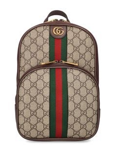 Height: 29cm Width: 20cm Depth: 5cm. Detachable adjustable strap. Single top handle. Zip closure. Front metal logo. Web detail. All over GG pattern placement may vary. Leather trim. Gold-colored metal hardware. One front zip pocket Designer Gucci Backpack With Zipper Closure, Gucci Luxury Backpack With Zipper Closure, Gucci Crossbody Shoulder Bag With Logo Hardware, Gucci Brown Standard Backpack, Brown Gucci Standard Backpack, Gucci Brown Backpack For Daily Use, Gucci Crossbody Bag With Logo, Gucci Shoulder Bag With Logo Hardware For Everyday Use, Gucci Brown Travel Backpack