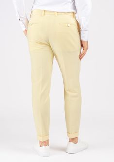 Crafted with a vibrant, cream yellow stretch cotton, these custom made pants are uniquely stylish and supremely comfortable, and will become a go to favorite when you're looking to stand out. Fitted High-waisted Summer Chinos, Chic Fitted Cotton Chinos, Fitted Tapered Leg Summer Chinos, Fitted Cream Cotton Pants, Cream Stretch Cotton Pants, Stretch Cotton Cream Pants, Chic Yellow Tapered Leg Pants, Chic Yellow Tapered Pants, Yellow Stretch Tapered Leg Bottoms