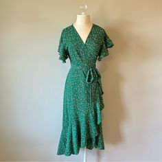 Max Studio Ruffle Crepe High Low Wrap Midi Dress, Beautiful Green Floral Pattern, Size Xs. New With Tags And Never Worn! Surplice Neck Tiered Ruffle Short Sleeves Wrap Style With Side Tie Closure High/Low Hem Spring Fitted Wrap Dress With Ruffle Hem, Fitted Green Wrap Dress With Short Sleeves, Green Fitted Short Sleeve Wrap Dress, Green Fitted Knee-length Wrap Dress, Spring Green Flowy Wrap Dress, Fitted Wrap Dress With Ruffle Hem And Short Sleeves, Fitted Wrap Dress With Ruffles And Short Sleeves, Fitted Green Wrap Dress For Summer, Fitted Casual Wrap Dress With Ruffles