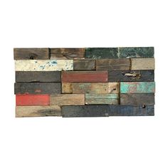 a wall made out of wooden planks with different colors and patterns on it's sides