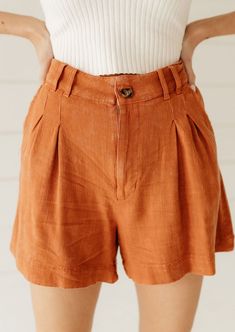 These pleated linen shorts are your daily dose of style. RUNNING BIG SUGGESTED SIZE CHART: SMALL: 4/6 MEDIUM: 7/9 LARGE: 12/14 Model Stats:Model is a US size Small.• Height: 5'4"• Bust: 34B”• Waist: 26”• Bottom Size: 3• Hips: 32”• Inseam: 33” These feature a mineral-washed fabric that shapes a flattering high waist with belt loops and relaxed legs. High-waisted Pleated Shorts For A Day Out, Trendy Linen Shorts For Day Out, Trendy Linen Shorts For Summer, Trendy Pleated Short Shorts, Spring Linen Pleated Bottoms, Spring Pleated Linen Bottoms, Spring Pleated Shorts With Short Inseam, Chic Pleated Summer Shorts, Pleated Shorts For Day Out