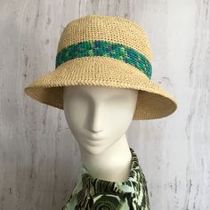 Raffia bucket hat  Straw summer hat with a bright stripe in shades of green.  Crocheted from 100% natural raffia pulp. Hats made of this natural material perfectly pass moisture, do not soar and protect from the sun. A hat with a small brim will provide plenty of shade. The perfect hat for summer travel. Very light and breathable.   Please measure your forehead at the widest point or where you would like the hat to be before placing an order.   Recommended care: * Hand wash in cold water without Raffia Bucket Hat, Hat For Summer, Raffia Crochet, Raffia Hat, Bright Stripes, Cotton Hat, Summer Hat, Green Tones, Cute Hats