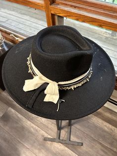 Discover the rugged charm of our Burned Western Hat. This unique, handcrafted cowboy hat features a distressed look, giving it a vintage, well-worn appeal perfect for Western enthusiasts and fashion-forward individuals. Features: Handcrafted Design: Each hat is meticulously burned and distressed to achieve a one-of-a-kind look. Premium Materials: Made from high-quality materials for durability and comfort. Unique Aesthetic: The burned finish adds a distinctive vintage style that sets it apart. B Black Bohemian Felt Hat For Western-themed Events, Bohemian Black Hat For Western-themed Events, Bohemian Black Hat Band For Western-themed Events, Bohemian Black Hat Bands For Ranch, Bohemian Fedora For Country Events, Black Bohemian Felt Hat For Kentucky Derby, Black Rustic Adjustable Hat, Bohemian Fedora For Western-themed Events, Black Rustic Hat For Rodeo