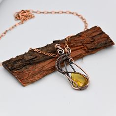 ITEM DETAILS Item Type ~ Pendant with Chains  Gemstone Name - Hydro Citrine Metal ~ Copper Wire Pendant Size :-  "Length: 2.5 Inches Width: 0.7 " Inches Quantity ~ 1 Piece Polish ~ Oxidized Why Copper :  The folk medicine tradition of wearing a copper bracelet has been around for thousands of years. Proponents believe that wearing the bracelet allows trace amounts of copper, an essential mineral, to rub off into the skin and be directly transferred into the bloodstream. Wearing a copper bracelet Yellow Pendant Jewelry With Lobster Clasp, Gold Necklace With Copper Wire As Gift, Copper Wire Teardrop Pendant Jewelry Gift, Copper Wire Teardrop Pendant Jewelry For Gift, Copper Teardrop Necklace For Gifts, Amber Metal Pendant Jewelry, Amber Colored Metal Pendant Jewelry, Yellow Metal Pendant Jewelry, Teardrop Copper Wire Jewelry For Gifts