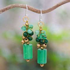 Different shapes and shades of gorgeous green quartz beads are skillfully combined with brass beads in this pair of precious dangle earrings to create a mesmerizing effect that will catch the eye of anyone in the room. Thailand's Nareerat adds golden metallic thread accents for a dash of glamor and completes her design with a brass ring and sterling silver hooks. Jewelry Making Earrings, Brass Beads, Handmade Beaded Jewelry, Quartz Beads, Green Quartz, Beaded Dangle Earrings, Brass Ring, Stunning Necklace, Metallic Thread