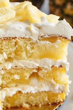 a piece of pineapple cake with white frosting