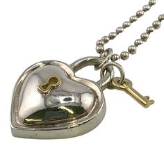 Used Tiffany&Co. Tiffany Heart Lock 925x750 30.3g Necklace Silver Women's (Sku: Gzl14p4n) === General === Brand : Tiffany === Design === Necklace Type : Necklace Gender : Women Material : Silver 925 Color : Gold, Silver === Size === Neck Circumference : 92 Cm / 36.22'' Pendant Size : 35mm X 26mm / 1.37'' X 1.02'' === Included Items === Accessories : Box, Dust Bag Accessories Notice : Before Purchasing, Please Refer To The Images Of The Accessories Included With The Item. === Condition === Condit Tiffany And Co Heart Lock Necklace, Heart Lock, Tiffany Jewelry, Accessories Box, Tiffany Heart, Glass Necklace, Necklace Silver, Woman Colour, Tiffany & Co.