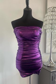 Crafted from durable spandex material and featuring a stunning purple color, this cocktail dress boasts a sleek bodycon silhouette with a strapless neckline and elegant ruched embellishment. The mini length and zip-up back add a touch of sophistication to this must-have piece. SKU: 3620 Spandex material Purple color Bodycon silhouette Strapless neck Ruched embellishment Mini length Zip-up back Highly suggest custom size for plus size. Ship in 7-10 business days. We offer free returns in 7 days. Please refer to our return policy page for more details. If you have any questions, don't hesitate to contact us: at service@dressesforparty.com. Strapless Fitted Purple Bodycon Dress, Purple Strapless Evening Bodycon Dress, Evening Purple Strapless Bodycon Dress, Strapless Purple Bodycon Evening Dress, Evening Strapless Purple Bodycon Dress, Elegant Purple Bodycon Club Dress, Elegant Purple Bodycon Dress For Club, Purple Strapless Stretch Bodycon Dress, Fitted Purple Strapless Party Dress