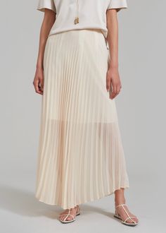 Color: Beige Lightweight fluid sheer fabric Relaxed silhouette Maxi length Pleating throughout Concealed side seam zip closure Partially lined 100% Polyester Dry Clean By The Frankie Shop. Imported The Frankie Shop, Frankie Shop, Pleated Maxi Skirt, Pleated Maxi, Sheer Fabric, Sheer Fabrics, Maxi Skirt, Dry Clean, Skirt