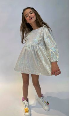 Description: Soft shimmer hologram dots make this dress so sparkly and magical This dress is the perfect outfit for your next party Pair it with your favorite boots and some jewelry to complete the look Material & Care: Gentle wash in cold Do Not Iron Do Not Bleach Do Not Dry Clean Hang Dry Glitter Party Outfit, Hologram Dress, Glitter Outfit, Shimmer Dress, Glitter Party, Favorite Boots, Kids Fashion Girl, Perfect Outfit, Photo Sessions