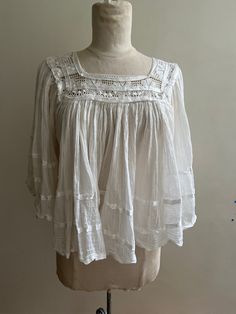 Great condition vintage womens below waist sheer Mexican top with lace and ribbon detail. White Cropped Lace Top With Lace Trim, Summer Lace Blouse With Lace Collar, White Summer Blouse For Gatherings, Summer White Blouse For Gatherings, White Blouse For Summer Gatherings, Summer Cotton Lace Blouse, Summer Cotton Lace Top Blouse, Spring Cotton Lace Blouse With Lace Work, Chic Cotton Lace Summer Tops