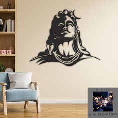 a living room with a wall decal that has an image of a woman's face on it