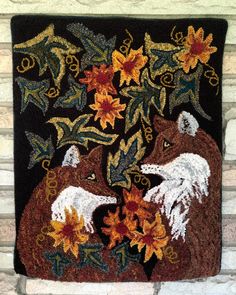 two foxes with flowers in their paws on a black background, surrounded by leaves and acorns