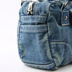 This denim bag captures the Y2K aesthetic with its star design and silver buckle detail. Featuring zip and button fastening and double side pockets, it's a trendy choice for anyone looking for a streetwear accessory that's cool and casual. Y2K aesthetic Silver buckle detail at front Zip & button fastening Double pockets at side Size: height 38 cm (14.9inc) length 26cm (10.2inc) width 9cm (3.5inc) Trendy Denim Bags With Zipper Closure, Y2k Streetwear Bag With Zipper Closure, Trendy Shoulder Bag With Zipper For Streetwear, Trendy Shoulder Bag With Zipper Closure For Streetwear, Trendy Streetwear Shoulder Bag With Zipper Closure, Blue Bags With Adjustable Strap For Streetwear, Blue Streetwear Bag With Adjustable Strap, Y2k Bags With Zipper Closure For Everyday Use, Y2k Style Bags With Zipper Closure For Everyday Use