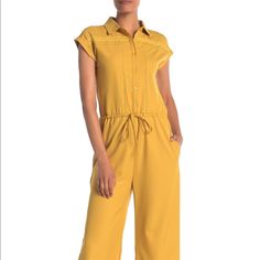 Nwt One One Six Short Sleeve Front Button Jumpsuit In Mustard Size Small ***The Drawstring Is Missing And There Is A Snag On The Bottom Right Pant Leg*** A Lace Knit Trim, Solid Exterior, And Short Sleeves Completes This Jumpsuit. - Pointed Collar - Partial Front Button Closure - Short Sleeves - Drawstring Waist - 2 Side Pockets - Lace Knit Trim - Solid - Approx. 55" Length, 28" Inseam (Size S) Fiber Content 97% Polyester, 3% Spandex Casual Yellow Jumpsuits And Rompers For Work, Fitted Orange Jumpsuits And Rompers For Work, Yellow Jumpsuits And Rompers For Spring Workwear, Spring Yellow Jumpsuits And Rompers For Workwear, Fitted Orange Jumpsuits For Work, Orange Jumpsuits And Rompers For Work, Yellow Jumpsuit For Spring Workwear, Casual Collared Jumpsuits And Rompers For Work, Spring Collared Jumpsuits And Rompers With Buttons