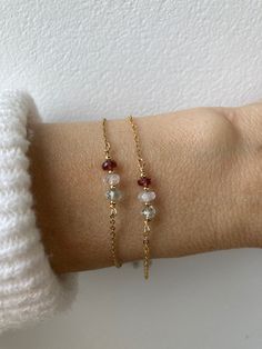 This dainty bracelet features the gentle essence of moonstone, tourmaline and aquamarine  that are associated with fertility and a healthy pregnancy. D E T A I L S *Made with a trio of AAA quality gemstones that measure between 3.5 and 4.5mm. *Choose between a stainless steel chain available in gold, silver, rose gold or a 14k gold filled chain, rose gold filled or sterling silver chain. *The gemstones included are moonstone, aquamarine and pink tourmaline. *Bracelet comes with care instructions Dainty Moonstone Bracelets With Natural Stones, Dainty Moonstone Bracelet With Natural Stones, Delicate Silver Bracelets With Ethical Gemstones, Dainty Birthstone Bracelets For Healing, Dainty Hypoallergenic Healing Bracelet, Dainty Moonstone Bracelets For Everyday, Elegant Healing Bracelet With Birthstone, Everyday White Birthstone Bracelets, Everyday White Birthstone Bracelet