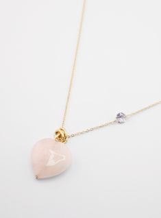 Crafted with a heart-shaped pink quartz stone, this necklace embodies love and compassion. The soft pink hue radiates a gentle energy, while the delicate craftsmanship adds an elegant touch. Love And Compassion, Rose Necklace, Pink Quartz, Oils For Skin, Intense Workout, Emotional Healing, Quartz Stone, Spiritual Growth, Soft Pink