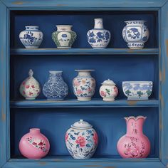 a blue shelf filled with vases on top of it's sides and bottom shelves