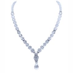 Step into a realm of enchanting romance with our captivating necklace. Handmade in the USA, this exquisite piece from our Bridal Collection features Austrian crystals intricately arranged to evoke the essence of love. With its mesmerizing design, it's the perfect accessory to adorn on your special day, adding a touch of divine elegance to your bridal ensemble. Opulent Diamond Necklace For Formal Events, Opulent Diamond Necklace For Formal Occasions, Opulent Round Necklaces For Formal Occasions, Formal Diamond Necklace With Jewels, Opulent Formal Necklace With Elegant Design, Elegant Long Silver Diamond Necklace, Elegant Diamond Necklace For Formal Occasions, Elegant Diamond Necklace With Jewels For Formal Occasions, Silver Long Diamond Necklace Elegant