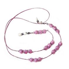 "Reading glasses cord lanyard chain holder. This lanyard is made with soft 2mm, polished cord, so comfortable to wear. Strung with light weight, acrylic pink beads, imprinted with a silver rose pattern. Antique silver colored findings. The length is 70 - 75 cms (28 - 30\"), but if you would like a different  length made for you, please ask.  The rubbers are attached with split rings, for easy replacement. All our cords come with a replacement set of rubber attachments. Neck chain for reading gla Pink Beaded Lanyards For Gifts, Handmade Adjustable Pink Glasses Chains, Adjustable Pink Glasses Chains As Gift, Handmade Pink Beaded Lanyards, Pink Round Beads Necklace For Personal Use, Adjustable Pink Glass Glasses Chains, Pink Adjustable Glasses Chains For Gift, Pink Adjustable Glasses Chains As Gift, Trendy Pink Glasses Chains For Gifts