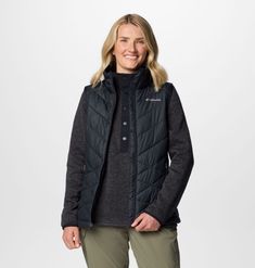 Stay warm to the core. The perfect outer layer for chilly weather, this vest combines synthetic insulation, thermal-reflective lining, and light-rain-repellent tech to keep you toasty and dry. Parka Vest, Lightweight Vest, Sweatshirt Short Sleeve, Vest Shirt, Womens Fleece, Mens Fleece, Water Resistant Fabric, Snow Suit, Columbia Sportswear