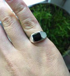 ✔️About the ring Minimalist signet ring suitable for women and men. Made of silver and black onyx stone. Perfect for everyday wearing as well as some special occasions. Looks great alone or stacked with other rings. ✔️Material Sterling silver 925 and natural black onyx. ✔️Size All sizes are available. If you don't know your finger size, here is a simple way to measure it: 1. Wrap string or paper around your finger. Be careful not to make it too tight. 2. Mark the point where the ends meet. 3. Me Silver Pinky Ring, Onyx Signet Ring, Ring Square, Black Stone Ring, Silver Signet Ring, Onyx Jewelry, Black Onyx Stone, Black Onyx Ring, Ring Minimalist