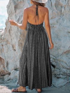 This Cabo Holiday Printed Backless Maxi Dress is perfect for any special occasion. It boasts a grey printed pattern and features an open backless design for a stylish and feminine look. Made of high-quality fabric, the dress is comfortable, breathable, and durable. Get ready to turn heads! Rayon/CottonPull On ClosureDry Clean Only Size ChartXS = Dress 0-2, Bust, 31"-32.5", Waist 23"-24Small = Dress 4-6, Bust,33"-35", Waist 25-26", Hips 35"-37"Medium = Dress 8-10, Bust 35-36" Waist 27-28", Hips 3 Casual Gray Maxi Dress For Beach, Casual Gray Maxi Dress For The Beach, Bohemian Backless Maxi Dress With Smocked Back, Backless Sundress With Smocked Back, Vacation Backless Maxi Dress With Smocked Back, Sleeveless Smocked Back Backless Dress For Beach, Sleeveless Smocked Back Backless Beach Dress, Sleeveless Backless Dress With Smocked Back For Beach, Elegant Backless Dress With Smocked Back For Vacation