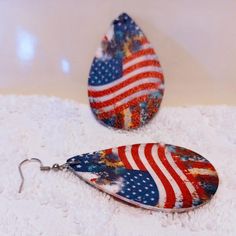 Show Off Your Patriotic Spirit With These American Flag Earrings! Water Drop Dangle Design Adds A Unique Touch To Your Outfit. Perfect For Women And Girls Of All Ages. Makes A Great Holiday Decor Or Jewelry Gift For Independence Day. High-Quality Materials Ensure Durability And Long-Lasting Wear. Wear Them To Your Next 4th Of July Party Or Parade And Show Your Love For The Usa! Patriotic Earrings For Summer Gift, Red Dangle Earrings For 4th Of July, Handmade White Earrings For 4th Of July, Red Jewelry With Ear Wire For Independence Day, Patriotic Multicolor Earrings For Independence Day, Patriotic Multicolor Earrings As Gift, Multicolor Earrings For Independence Day Gift, Flag Earrings, July Colors