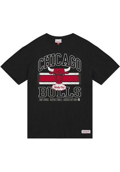 Support your Chicago Bulls in this Black Short Sleeve Fashion Tee! This Logo Lockup Fashion T Shirt features a screen print team graphic on chest. Be ready to shout "Go Bulls" when you wear this Chicago Short Sleeve Fashion T Shirt in the stadium or on the street. Lightweight material, Crew neckline, Screen print team graphic, Brand tag on left hip, Unisex, Fit: True to Size, Imported Throwback Black Sports T-shirt, Throwback Black T-shirt For Sports Events, Black T-shirt With Team Logo For Fans, Throwback Sports T-shirt With Screen Print, Black Cotton T-shirt With Team Logo, Throwback T-shirt With Logo Print For Game Day, Team Logo Tops For Streetwear, Throwback Cotton T-shirt With Team Logo, Streetwear Top With Team Logo