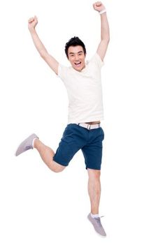 a man jumping up in the air with his arms wide open and legs spread out