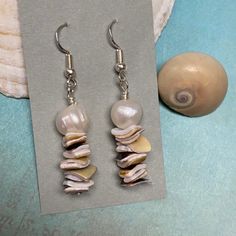 Take Me To The Beach ! And You Can Come Along. Fit For A Mermaid, I Made These With Genuine Freshwater Potato Pearls Placed Atop Stacked Shell Fragments. Stunning Summer Fun. Made By Me New, Never Worn Silver Plated Nickel Free Ear Wires Bundle With Other Items For A Discount & Pay Only One Shipping. See You At The Beach! Beachy Mermaid Pearls Freshwater Shells Coastal Summer Handmade White Shell Dangle Pearl Earrings, White Shell Pearl Dangle Earrings, White Dangle Shell Pearl Earrings, White Dangle Pearl Earrings With Shell, White Shell Dangle Jewelry, White Shell Pearl Earrings For Beach, Elegant White Pearl Earrings For Beach, White Dangle Earrings For Beach, White Dangle Pearl Earrings For Beach