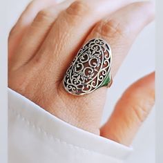 The Filigree Shield Ring Is A True Masterpiece Of Craftsmanship And Style. Its Intricate Design Captures The Eye With Its Delicate Details And Elegant Curves. This Ring Not Only Adds A Touch Of Sophistication To Any Outfit But Also Provides A Comfortable And Lightweight Feel On The Finger. Whether Worn For A Special Occasion Or As An Everyday Accessory, This Ring Is Sure To Make A Statement And Elevate Your Look With Its Unique Charm. Wear It With Confidence And Let Its Beauty Shine Through As Y Shield Ring, Bohemian Ring, Bali Silver, Silver Tops, Bohemian Rings, Sterling Silver Filigree, Everyday Accessories, Delicate Details, Silver Filigree