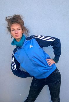 "Blue ADIDAS workout jacket, neon tracksuit, bomber jacket, outdoor windbreaker, running jacket, S/M Warm and comfortable ADIDAS neon tracksuit. It has two side pockets (with zipper) and zipper closure. Size: showed L (USA), seems like women (M) and men (S) PLEASE CHECK ALL MEASUREMENTS BELLOW: Length: 60 cm/ 24\" Shoulder to shoulder: 42 cm/ 17\" Sleeves: 63 cm/ 25'' Chest: 106 cm/ 42\" Brand: ADIDAS Condition: excellent Fabric: polyester Model wears: UK 8/ EU 36/ US 4 Model's height: 175 cm/5' Luxury Blue Winter Track Jacket, Jacket Outdoor, Running Jacket, Workout Jacket, Blue Adidas, Sports Jacket, Buy Dress, Sport Fitness, Rain Jacket