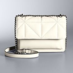 Add some glam toyour look with this Simply Vera Vera Wang Cleo Accordion Crossbody Bag. Add some glam toyour look with this Simply Vera Vera Wang Cleo Accordion Crossbody Bag. DETAILS Crossbody bag 7.9" x 5.7" x 2" Crossbody strap extends from 11.25" or 21.5" Magnetic snap closure Interior pockets: 1 zip pocket and 1 slip pocket Exterior pocket: 1 snap pocket Gunmetal hardwareCONSTRUCTION & CARE PU, polyester Wipe clean Imported Size: One Size. Color: Stream Geo Quilt. Gender: female. Age Group: Bag Details, Simply Vera Wang, Simply Vera, Vera Wang, Crossbody Strap, Handbag Accessories, Snap Closure, Women's Accessories, Gender Female