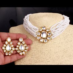 Ashura jewels beautiful wedding wear Kundan Choker necklace set Wedding & party wears stone necklace set this set can wear very easily. we ship our item everywhere . Color White design Necklace stone Kundan stone color white material gold plated we ship our item everywhere 3 to 5 days to deliver $20 dollar Express shipping Kundan Choker Necklace, Party Wears, Pink Choker, Stone Necklace Set, Kundan Choker, Jewelry Set Design, Necklace Stone, Choker Necklace Set, Kundan Necklaces