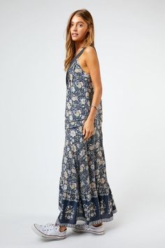 Step away from the same-old and go for something new this season. Show your wild and romantic side in this beautiful floral maxi dress. With a v-neck and button front detail, this dress is easy to wear and has side pockets for a practical edge. The relaxed fit will keep you comfortable during long days and nights. With this sophisticated and timeless piece, your fashion-forward wardrobe will speak volumes. Self: 100% RayonContrast: 80% Cotton, 20% PolyesterLining: 100% Polyester Want to view thi V-neck Sundress With Ditsy Floral Print, Casual V-neck Maxi Dress With Ditsy Floral Print, Sundress With Ditsy Floral Print Maxi Length, Printed V-neck Rayon Maxi Dress, Flowy Ditsy Floral Print Maxi Dress, Bohemian Sleeveless Maxi Dress With Ditsy Floral Print, Casual Maxi Dress With Ditsy Floral Print, V-neck Ditsy Floral Print Sundress, Bohemian V-neck Rayon Maxi Dress