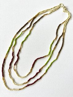 These fun and flirty three layer necklaces couldn’t be more perfect for summer! The colors are gorgeous and bright. Each necklace fastens in the back with a loop and beaded knot. All measure 12” from back to bottom layer except for Mermaid Purple. It measures 11”. Handmade by Dani and family in Mexico. Mermaid Purple, 3 Layer Necklace, Layer Necklaces, Kids Rings, Ring Sale, Three Layer, Layered Necklace, Wallet Bag, Gift Accessories