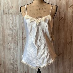 Nwt. Clean. No Flaws. Beaded Laced Neckline. Bridal Wear. 100% Polyester Size L 17” Ptp 14” Pit To Hem White Sleeveless Satin Camisole, White Satin Sleeveless Camisole, White Satin Tank Top For Summer, White Satin Cami Top, White Satin Camisole For Spring, White Lace Trim Tank Camisole, Linen Camisole, Green Cami, Cowl Neck Shirt