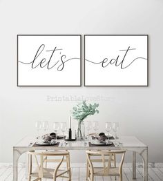 two black and white prints with the words let's eat on them in front of a