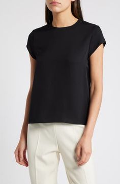 Clean lines elevate a lightweight top made from smooth and beautifully draping silk. Back keyhole with hook-and-eye closure Jewel neck Cap sleeves 100% silk Dry clean Imported Classic Silk Tops, Black Silk Top For Spring, Black Silk Tops For Spring, Elegant Fitted Office Top, Elegant Fitted Top For Office, Formal Short Sleeve Viscose Tops, Black Silk Short Sleeve Top, Classic Fitted Top For Evening, Chic Structured Formal Tops