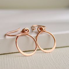 Petite hand formed hoops are absolutely perfect in their petiteness. Earrings measure just 3/4. ROSE GOLD - $20 Simple Rose Gold Hoop Earrings, Simple Design Hoop Earrings For Gift, Simple Design Hoop Earrings As Gift, Earrings Small Hoop, Dainty Hoop Earrings, Small Hoop Earrings, Small Rose, Earrings Dainty, Earrings Small